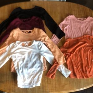 Girls size 6-7 long-sleeve shirts.